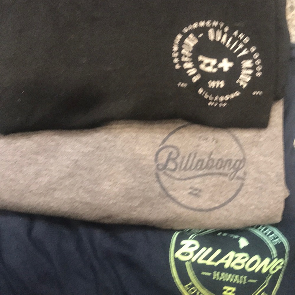 3 Men’s medium Billabong T-shirts.